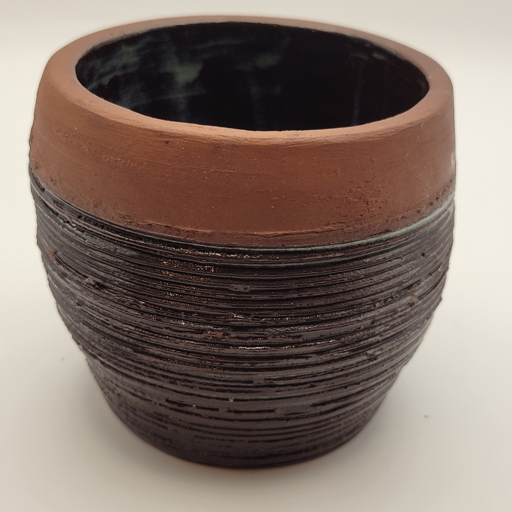Handthrown Pottery w/ unique grooved design. Red clay, finished interior. Small.